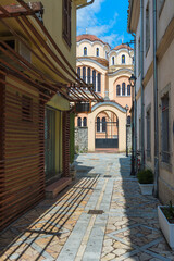 Fototapeta na wymiar Narrow passage leading to the Nativity of Christ Orthodox Cathedral, Shkodra, Albania