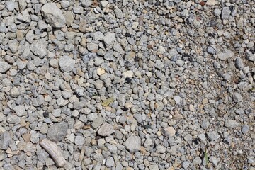 A close view on the rock and pebble gravel surface.