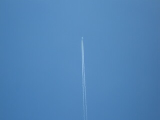 jet fog in blue sky