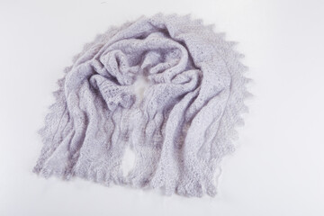 top view on folded handmade grey woolen scarf with knitted pattern