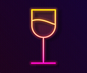 Glowing neon line Wine glass icon isolated on black background. Wineglass sign. Vector Illustration.