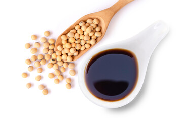Tasty soy sauce in white ceramic bowl with soy beans in wooden scoop  isolated on white background....