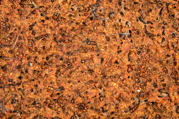 Abstract background of brown rough surface ground.