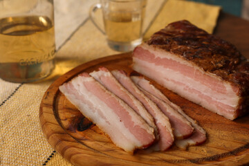 Artisanal sliced smoked bacon with cachaça