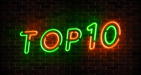 Top 10 neon light green and red text on empty red brick wall banner. Bright sign of top ten list...
