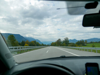 The autobahn, view from car, mountains