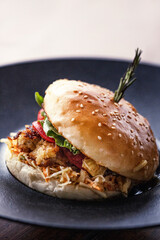 Healthy burger with meat, tomato and rucola