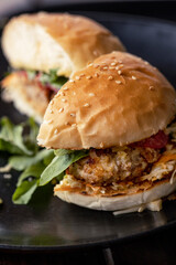 Healthy burger with meat, tomato and rucola