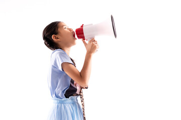 Asian child girl shouting with megaphone on white background