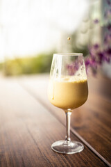 glass of ice turmeric latte