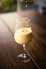 glass of ice turmeric latte