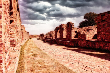 Rajasthan, India - October 06, 2012: A landscape of hilly mountains surrounding abandoned cursed...