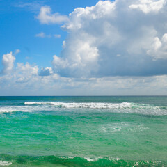 Fototapeta na wymiar Seascape and blue sky background. The concept is travel.