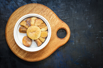 dried fruit figs sweet natural dessert sweetness Menu concept serving size. food background top view copy space for text organic healthy eating keto or paleo diet