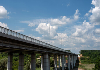 Fototapeta na wymiar Automobile bridge on the outskirts of the city.