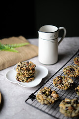 Mixed Nut and Dried fruits and Seeds Florentine, Gluten free whole foods Healthy biscuit cookies. set on cafe table.