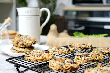 Mixed Nut and Dried fruits and Seeds Florentine, Gluten free whole foods Healthy biscuit cookies. set on cafe table.