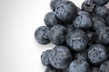 blueberry pile of blueberries fruit background with copy space healthy full of vitamins or antioxidants