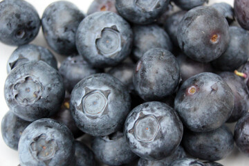 blueberry pile of blueberries fruit background with copy space healthy full of vitamins or antioxidants