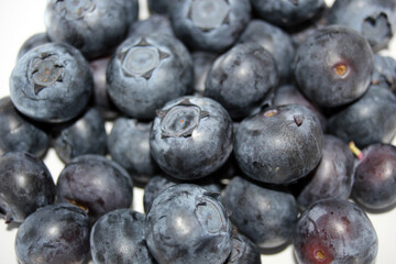 blueberry pile of blueberries fruit background with copy space healthy full of vitamins or antioxidants