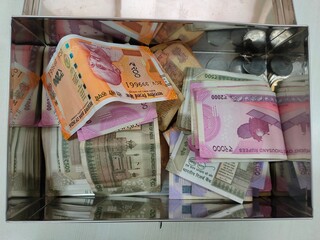 A box is full of indian currency