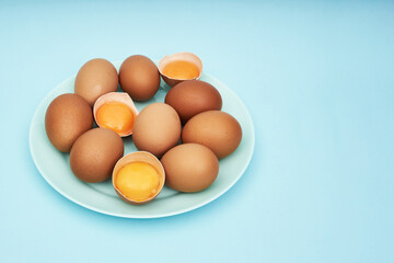 Chicken eggs on a saucer, a plate. Food, protein in foods.