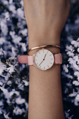 Fashion stylish beautiful watch on woman hand. Close-up photo.