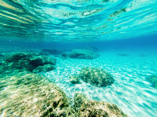 Obraz premium White sand and turquoise water in Alghero shore