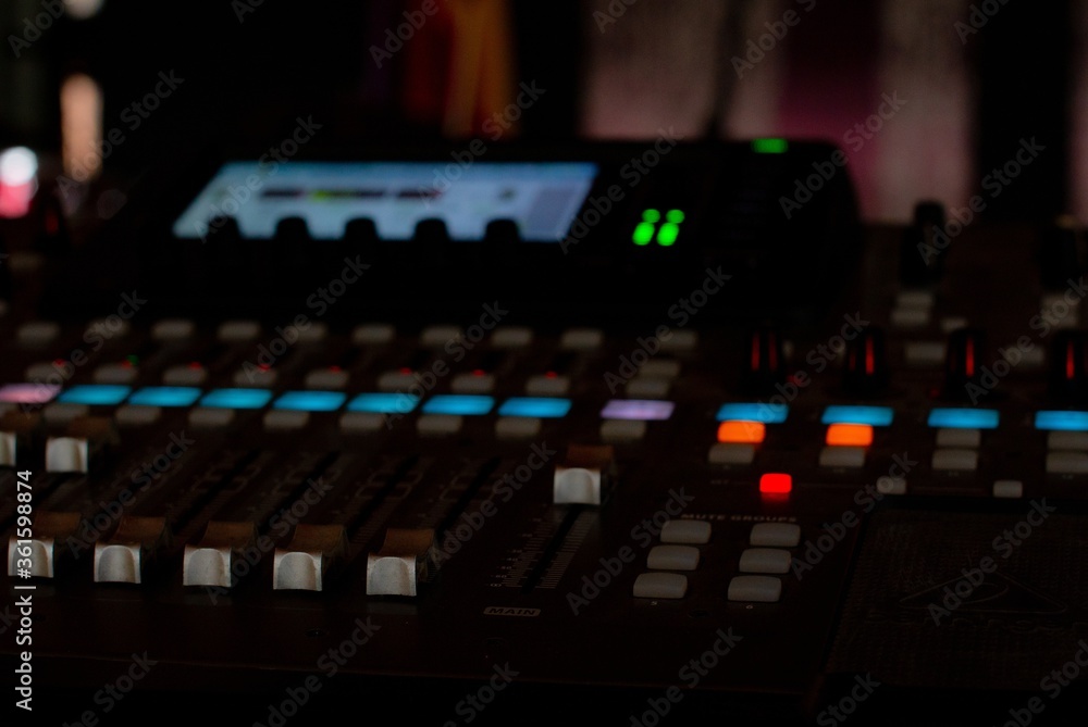 Poster closeup shot of a music keyboard equalizer colorful buttons