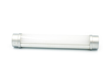 A long white light bulb on a white background