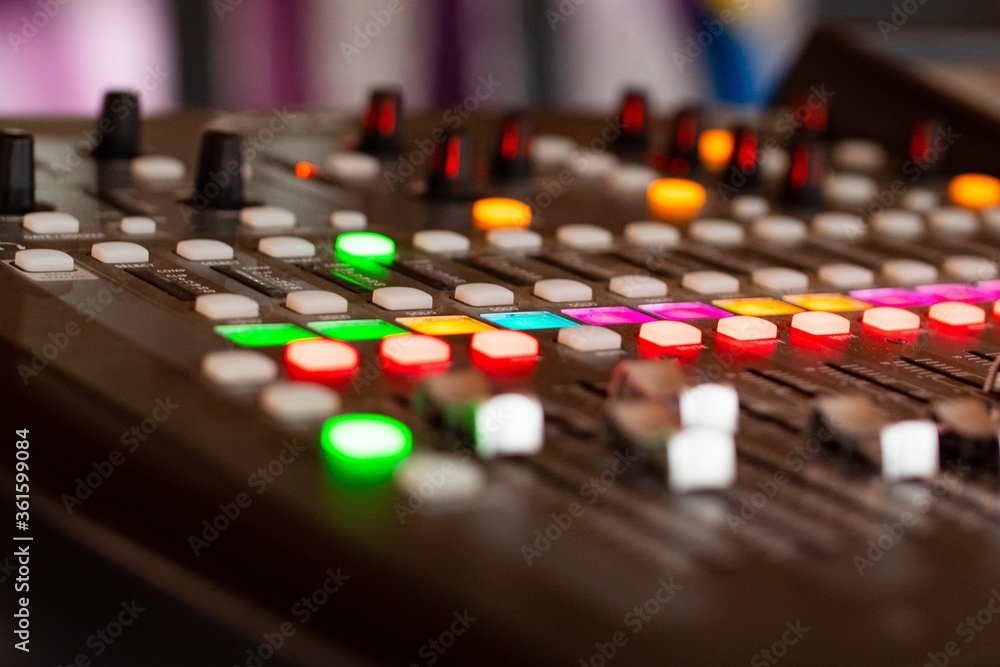 Poster closeup shot of a music keyboard equalizer colorful buttons