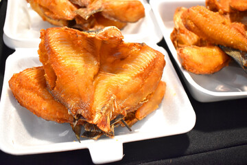 Deep fried sea bass fish with Fish Sauce ( Thai Food) in night market