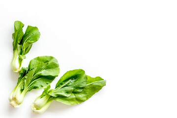Bok choy harvest on white background top-down copy space