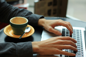 Fototapeta na wymiar close up of a businessman using a laptop