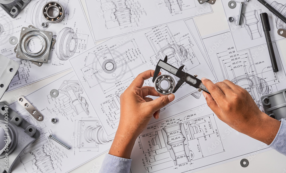 Poster Engineer technician designing drawings mechanical parts engineering Engine.manufacturing factory Industry Industrial work project blueprints measuring bearings caliper tools
