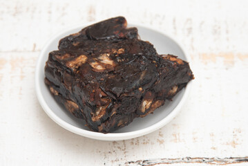 Tamarind paste or chutney, Imli or imalee crushed to paste served as a side dish for South Indian curry in Kerala Tamil Nadu India