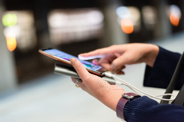 using cellphone in the rail station