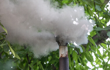 thick black smoke from the chimney