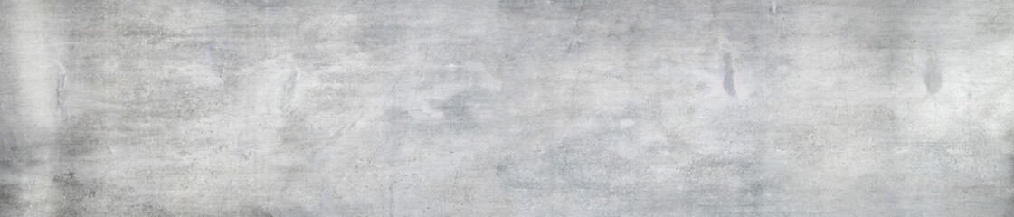 Panorama of a grungy concrete wall as background or texture