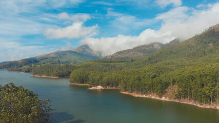 Aerial view beautiful nature with mountains and hills by Lake Mattupetty. Kerala State. Near the city of Munar.