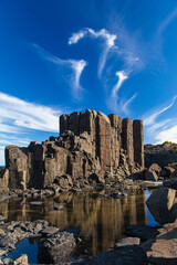 Bombo Headland Quarry Australia. Blue skies and reflections in water