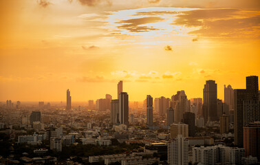 View of a high-rise building in Bangkok When the sun is about to set and when Thailand is covered...