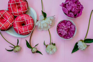 Flat photo with strawberry donut and peony flower