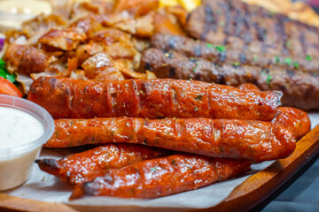 Greek / Arabic Restaurant Meat Platter, Lamb, Beef, Chicken, Pork Kebab Skewers Sauce Tahini Feta Fries Chips Sausages