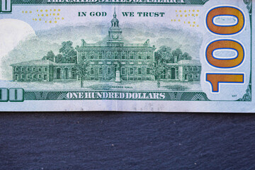 Selective focus on detail of 100 dollars banknote. Close up macro detail of money banknotes,...