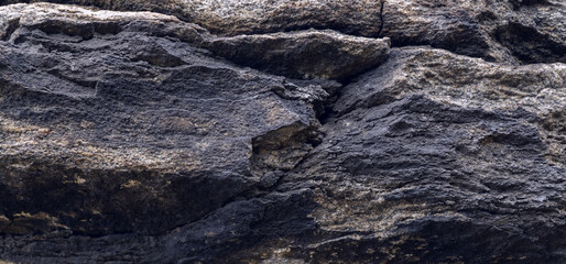 ledges on a layered brown rock texture