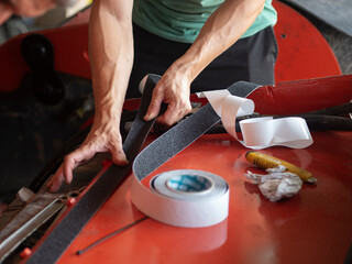 MECHANIC MAKING REPAIRS IN THE WORKSHOP