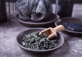 Charcoal cosmetic and skincare products. Spa and bath concept.