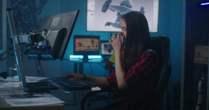 Female video game developer at work