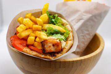 Grilled Chicken Gyros With Chips Bread Wrap Salad Tomatoes Seasoning Fries Wrapped Up Presented Wooden Greek Food Fast 
